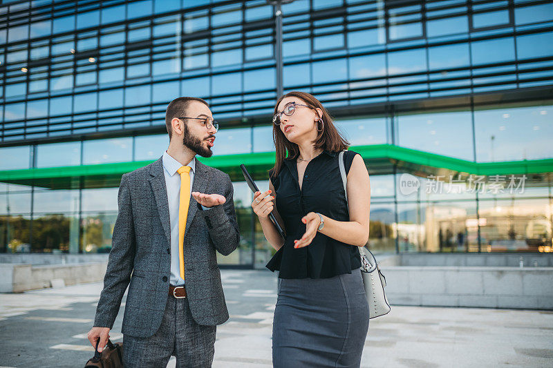 Colleagues in front of the office building